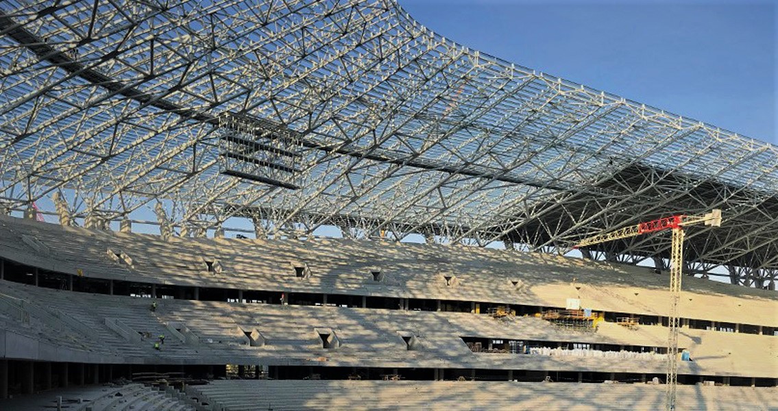 View inside the New Ferenc Puskás Arena in Budapest. There, 15,000 m² of grandstand flooring was coated with MC-Floor TopSpeed flex, the flexible roller coating with crack-bridging properties.